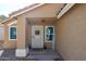 Close up of the front door, showing Welcome sign, security door, and well maintained front porch at 853 E Ross Ave, Phoenix, AZ 85024