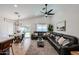 Inviting living room featuring a dining area, leather sectional, and contemporary decor at 853 E Ross Ave, Phoenix, AZ 85024