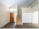 An open foyer features tile floors, a staircase to the second floor, and neutral wall colors at 909 W San Mateo Ct, Gilbert, AZ 85233