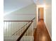 Hallway with hardwood floors and natural lighting at 909 W San Mateo Ct, Gilbert, AZ 85233