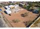 Aerial view of new construction home and backyard with pool under construction at 9611 E Clinton St, Scottsdale, AZ 85260