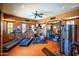 Well-equipped gym featuring modern equipment, natural light, and ample workout space at 10597 E Rising Sun Dr, Scottsdale, AZ 85262