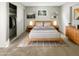 Comfortable bedroom with a king-sized bed, natural light, and a closet at 11609 N 30Th Ln, Phoenix, AZ 85029