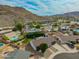 A landscape view featuring a backyard with mountain views, a backyard shed, and a playset at 13621 N 16Th Ave, Phoenix, AZ 85023