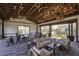 Large clubhouse with an open floor plan, ping pong, and lounge seating at 14598 W Wood Dr, Surprise, AZ 85379