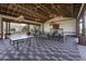 Spacious community room with ping pong table, fireplace, and ample seating at 14598 W Wood Dr, Surprise, AZ 85379