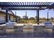 Community outdoor kitchen with BBQ grills, countertops, and sink at 14598 W Wood Dr, Surprise, AZ 85379