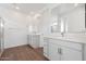 Elegant bathroom featuring dual vanities and modern fixtures at 14787 W El Cortez Pl, Surprise, AZ 85387