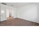 Bright bedroom featuring hardwood flooring and neutral walls at 14787 W El Cortez Pl, Surprise, AZ 85387