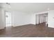 Spacious living room with tile flooring and ample natural light at 14787 W El Cortez Pl, Surprise, AZ 85387