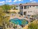 Beautiful desert property featuring a sparkling pool, outdoor kitchen, and covered patio at 1644 N Lynch --, Mesa, AZ 85207