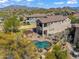 Stunning home features a private pool, a pergola, well-maintained landscaping, and mountain views at 1644 N Lynch --, Mesa, AZ 85207