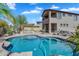 An inviting private backyard pool is surrounded by brick pavers, desert landscaping, and outdoor seating at 1644 N Lynch --, Mesa, AZ 85207