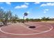 Outdoor community basketball court with a net and desert landscape at 1644 N Lynch --, Mesa, AZ 85207