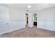 An empty bedroom with carpet flooring, ceiling fan, and neutral-colored walls showcases the space at 1644 N Lynch --, Mesa, AZ 85207
