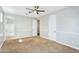 A primary bedroom includes carpet flooring, a ceiling fan, and an ensuite bath at 1644 N Lynch --, Mesa, AZ 85207