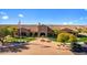 Exterior of a beautiful community clubhouse with manicured lawns and a paver driveway at 1644 N Lynch --, Mesa, AZ 85207