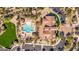 Aerial view of community pool with surrounding lounge areas, cabanas and lush landscaping at 1644 N Lynch --, Mesa, AZ 85207