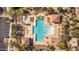 Aerial view of a pristine community pool surrounded by lounge chairs and desert landscaping at 1644 N Lynch --, Mesa, AZ 85207
