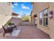 Cozy courtyard with brick pavers and ample space for seating arrangements, perfect for outdoor relaxation at 1644 N Lynch --, Mesa, AZ 85207