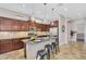 Well-equipped kitchen with granite countertops, stainless steel appliances, and center island with seating at 1644 N Lynch --, Mesa, AZ 85207