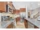 Modern kitchen featuring stainless steel appliances, granite countertops, and ample cabinet space at 1644 N Lynch --, Mesa, AZ 85207