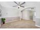 Spacious living room with plush carpeting, neutral tones, and ample space for entertaining at 1644 N Lynch --, Mesa, AZ 85207