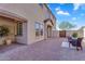 Charming patio area with brick pavers, offering a private and inviting outdoor space at 1644 N Lynch --, Mesa, AZ 85207
