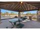 Covered picnic tables offer a relaxing space for outdoor dining with shade and seating at 1644 N Lynch --, Mesa, AZ 85207
