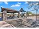 Community playground with swings and a covered picnic area for Gathering fun and gatherings at 1644 N Lynch --, Mesa, AZ 85207