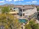 Rear exterior featuring a private pool, pergola, lounge chairs and mountain views in the background at 1644 N Lynch --, Mesa, AZ 85207