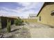View of a low maintenance backyard with desert landscaping and paver patio at 1973 N Lewis Pl, Casa Grande, AZ 85122