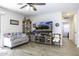 Cozy living room showcases wood-look tile flooring and comfortable seating, creating a welcoming space at 1973 N Lewis Pl, Casa Grande, AZ 85122