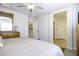 Well-lit main bedroom featuring a closet, light colored walls and tile floors throughout at 1973 N Lewis Pl, Casa Grande, AZ 85122