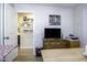 Office area leading to the bathroom, featuring desk space and storage at 1973 N Lewis Pl, Casa Grande, AZ 85122