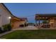 Charming backyard patio with string lights and an outdoor grilling area at 19777 E Ivy Ln, Queen Creek, AZ 85142