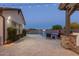 Relaxing backyard featuring a refreshing pool, lounge chairs, and lush greenery at 19777 E Ivy Ln, Queen Creek, AZ 85142