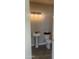 A half bathroom with a pedestal sink and toilet at 19777 E Ivy Ln, Queen Creek, AZ 85142