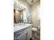 Bathroom vanity with a large mirror, attractive lighting and a view of the shower at 19777 E Ivy Ln, Queen Creek, AZ 85142