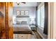 Well decorated bedroom with wall art, plantation shutters and a cozy aesthetic at 19777 E Ivy Ln, Queen Creek, AZ 85142