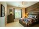 Bedroom with wood accent wall and baseball themed decor at 19777 E Ivy Ln, Queen Creek, AZ 85142
