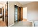 Bedroom with a closet featuring rustic sliding doors and interior storage shelves and rods at 19777 E Ivy Ln, Queen Creek, AZ 85142