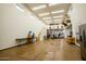 Large garage featuring epoxy floors, ample lighting, and staircase, ready for customization at 19777 E Ivy Ln, Queen Creek, AZ 85142