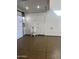 Garage interior with convenient sink and well-maintained epoxy flooring at 19777 E Ivy Ln, Queen Creek, AZ 85142