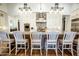 Charming kitchen with a large center island and modern lighting fixtures at 19777 E Ivy Ln, Queen Creek, AZ 85142