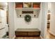 Mudroom features built-in bench, storage, hooks and shelves at 19777 E Ivy Ln, Queen Creek, AZ 85142