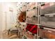 Organized storage featuring labeled clear bins on shelves for easy access to seasonal decor and supplies at 19777 E Ivy Ln, Queen Creek, AZ 85142