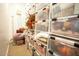 Extensive storage featuring labeled clear bins, maximizing space and organization for seasonal items and decor at 19777 E Ivy Ln, Queen Creek, AZ 85142