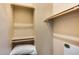 Organized closet with ample storage and shelving for clothing and personal items at 2402 E 5Th St # 1742, Tempe, AZ 85288