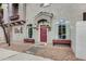 Charming home featuring a stylish front door, decorative flower boxes, and manicured landscaping at 2402 E 5Th St # 1742, Tempe, AZ 85288